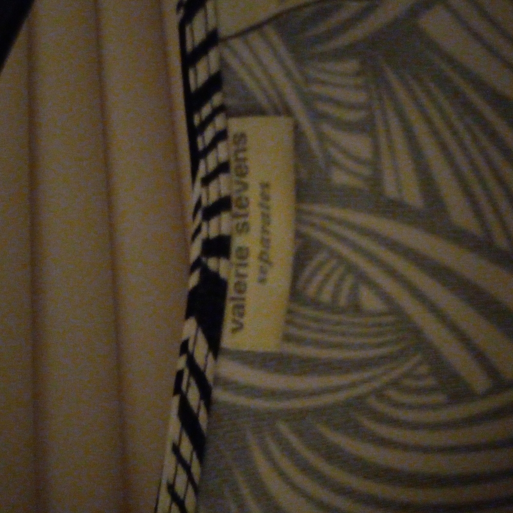 Gently used valerie stevens black and white wrap dress short sleeve. Med